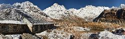 Panorama with lodge at Annapurna Base Camp in the sanctuary.