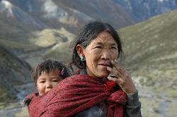 Men are often away on trade in summer and visit Tibet, women are left in the villages and take care of babies during their daily chores.