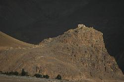 Sunset illuminates the ancient fortress of Zangla that stands above the village and guards the entry to the Jumlam; a complicated way to get to Leh that passes Basgo and was used by Dogra invaders in the past.