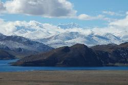 View from the monastery over Yamdruk Tso to some snow-capped mountains.