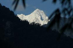 Last view of Kangchenjunga from Lingshan that rises above the steep hillsides.