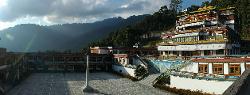 Panorama of the monastery with the densely forested hills of Sikkim.